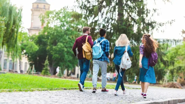 Naperville PD sparks conversation on college safety. 4 students walking on campus