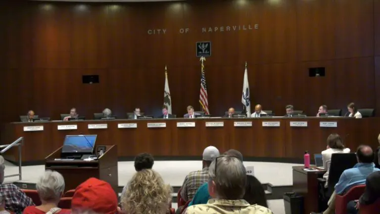 The Naperville City Council seated at the dais