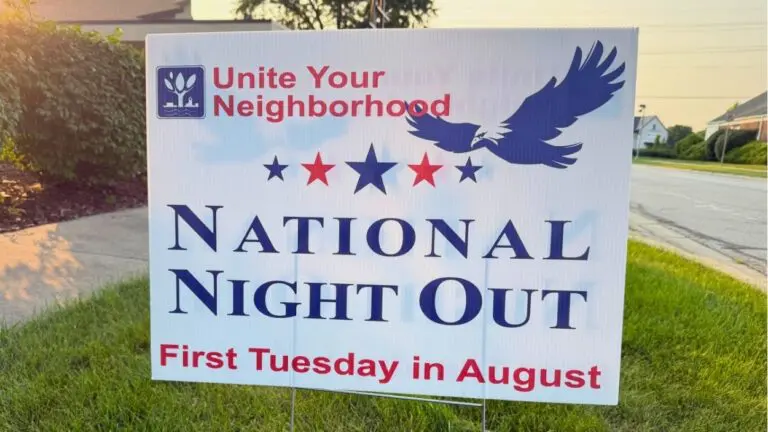 A law sign promoting Naperville's National Night Out event.