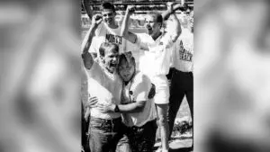 1994 image of Al Carius and Frank Gramarosso hugging at the National Championships black and white image