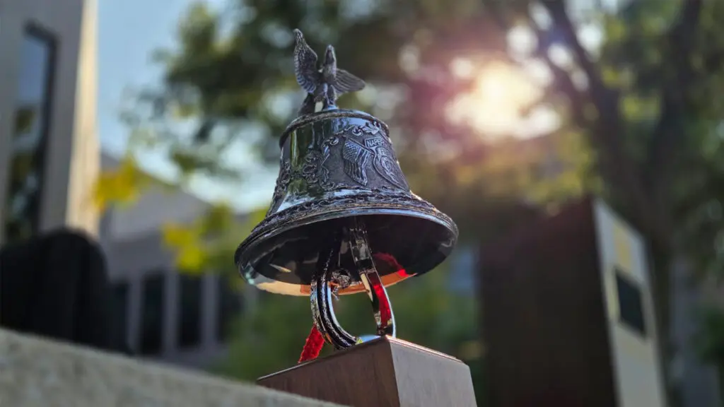 image of fire bell. 9/11 survivor shares her story at remembrance ceremony