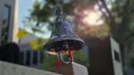 image of fire bell. 9/11 survivor shares her story at remembrance ceremony