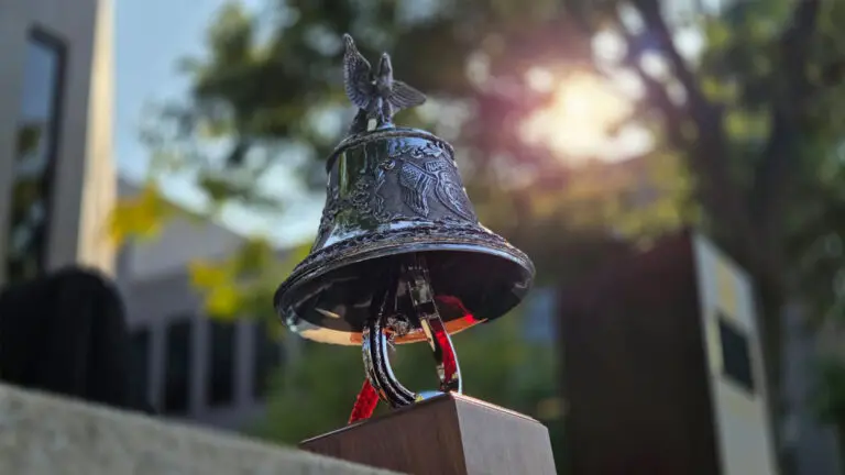 image of fire bell. 9/11 survivor shares her story at remembrance ceremony