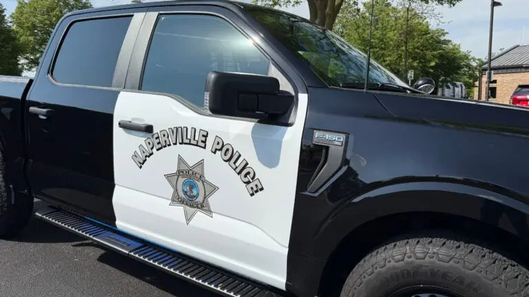 Homeless man charged in string of Naperville business burglaries. Police truck