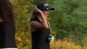 Benet Academy golfer reacts to a putt