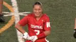 Malia Shen smiles on the field for Naperville Central.