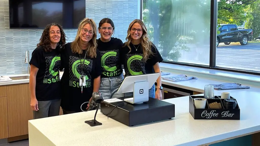 Connections crew at coffee bar check out set up at new facility