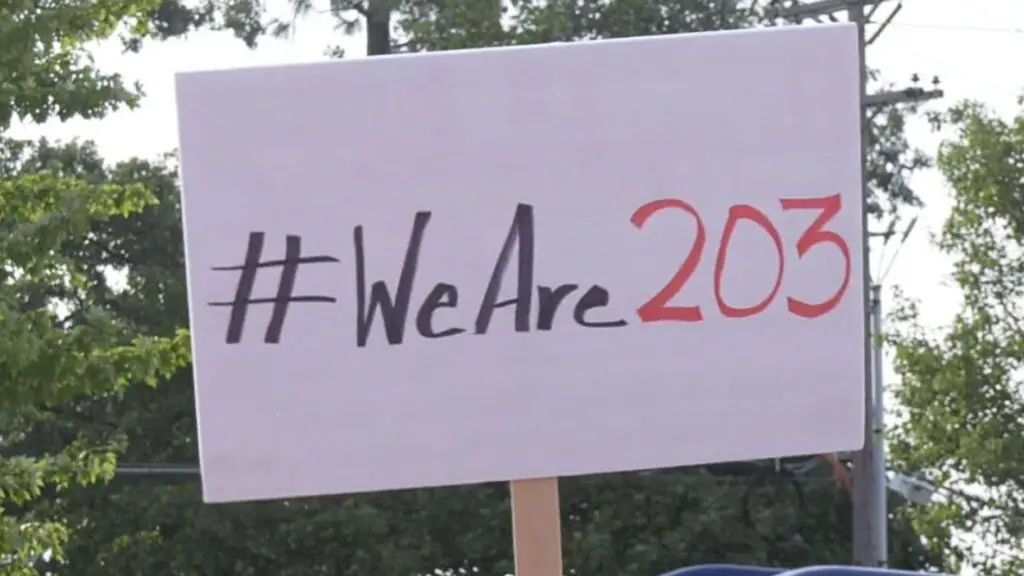 #WeAre203 sign at District 203 teacher contract rally