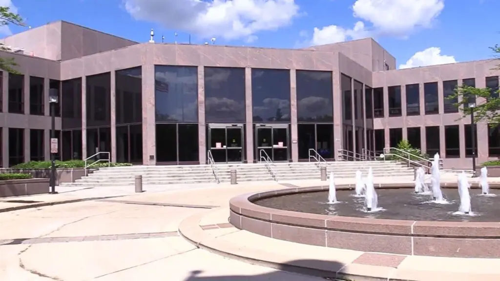 Front of Naperville Municipal Center with fountain in foreground