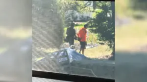 Photo neighbor shared with Fischer of roofer being detained