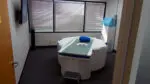 A Koning Vera Breast CT in an exam room.