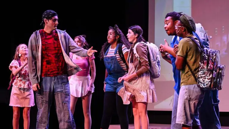 A group of actors on the stage.