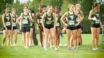 Waubonsie Valley Cross Country warms up before the Aurora City Invite.