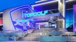 The exterior of Topgolf Naperville at night.