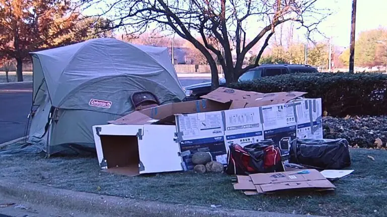 Tent and cardboard shelter set up outside for Sleep out Saturday event to raise awareness for homelessness