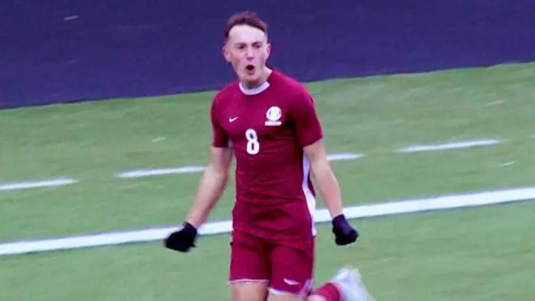 Lockport Porters' offense breezes by the competition as Jacob Hareza celebrates.