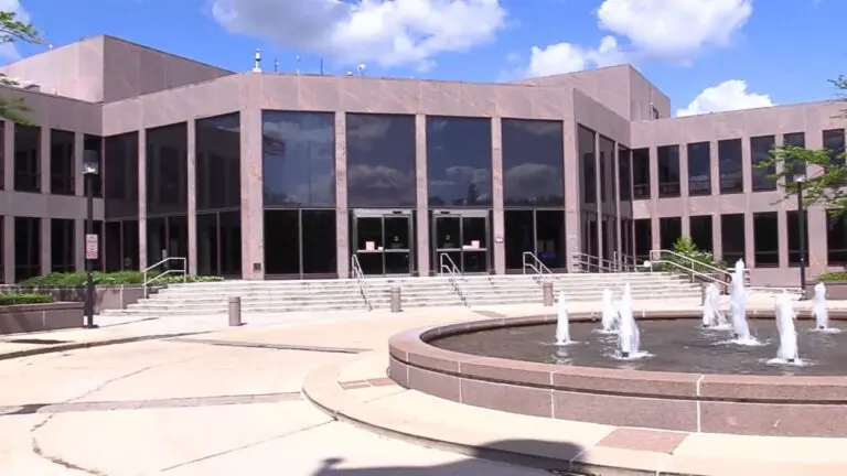 External shot of front of Naperville City Hall with fountain in foreground