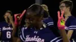 flag football dominates in popularity as a player poses on the field.