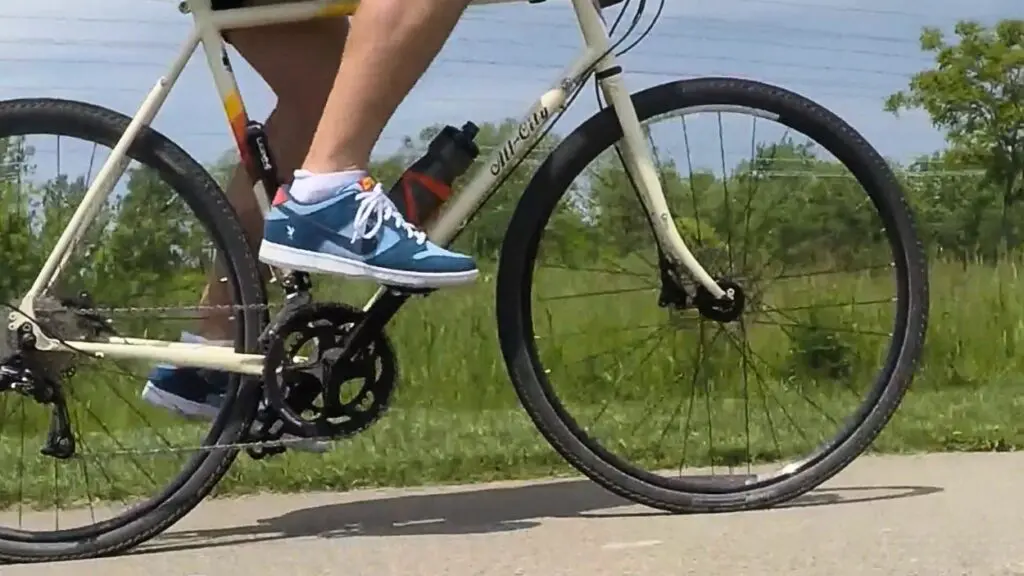Close up of bike with foot on pedal