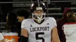 Neuqua Valley comes up short as a Lockport player stands on the field.