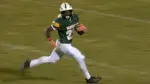Waubonsie Valley’s Elliott runs on the field
