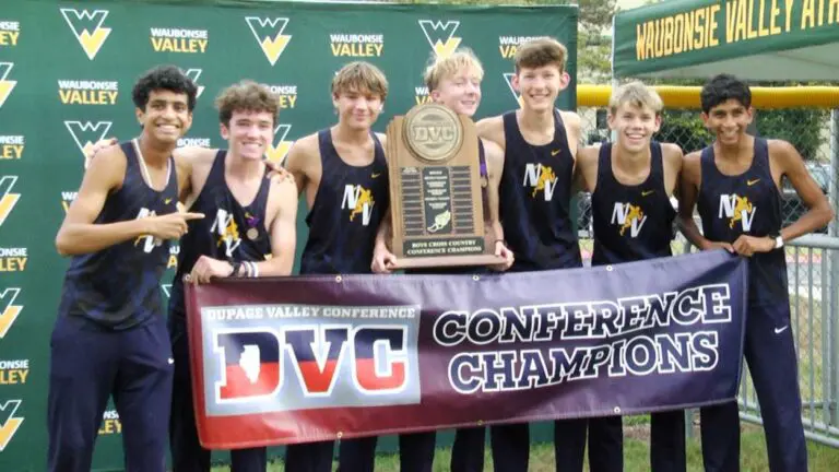 boys cross country DVC runners post with conference title