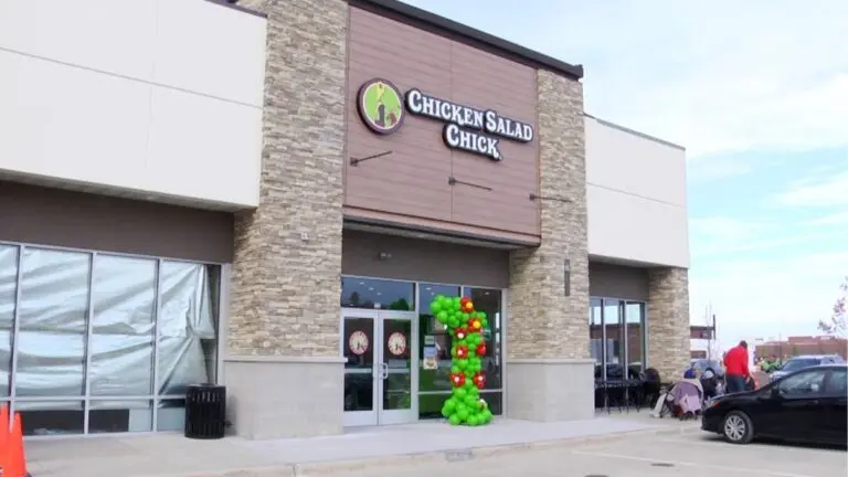 The exterior of Chicken Salad Chick is Naperville is decorated with balloons for its grand opening.