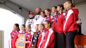 Barrington holds the IHSA 3A girls cross country state trophy