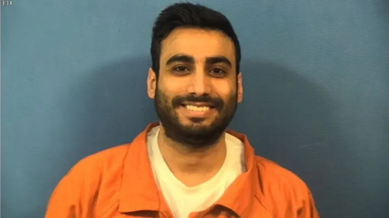 Naperville man charged with drug trafficking after fentanyl pills seized. Mug shot of Ahmad Dinah
