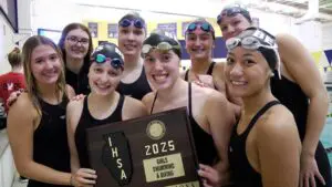 Rosary girls swimming wins sectional title at Neuqua Valley 2025.