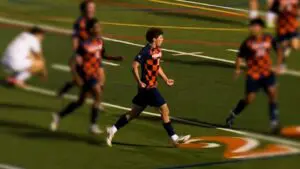 Sam Hess kicks thirty yards in the Sectional Championship for Naperville North in 2025.