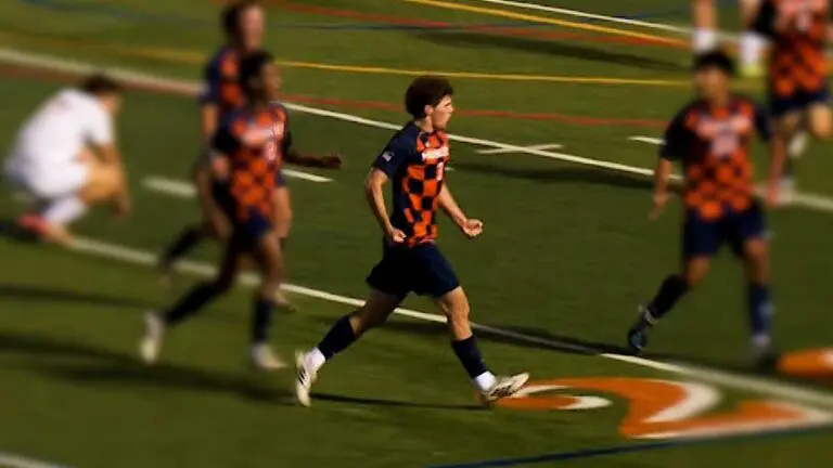 Sam Hess kicks thirty yards in the Sectional Championship for Naperville North in 2025.