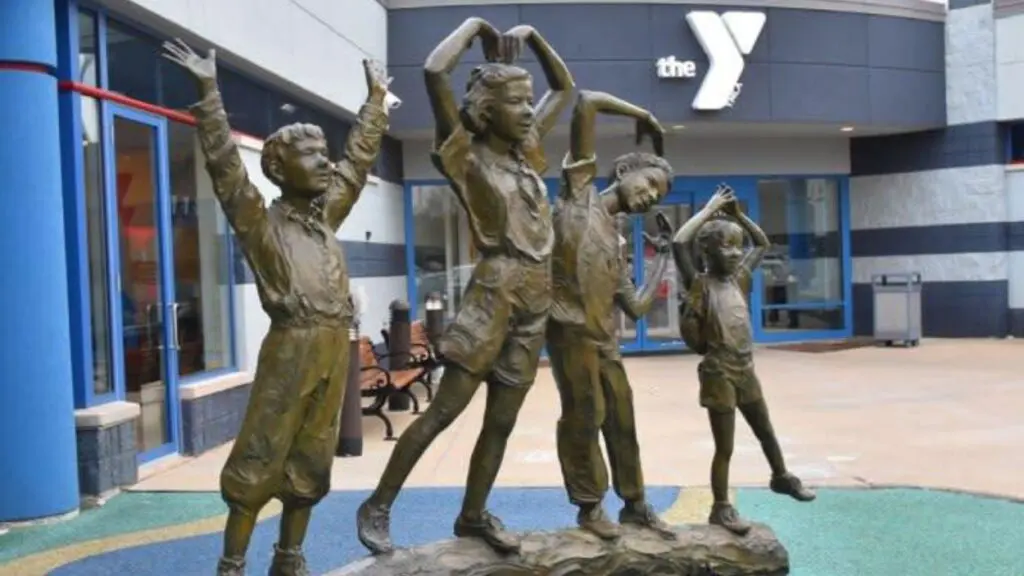 YMCA opposes Naperville Park District’s proposed expansion plans Image of kids statue in front of Fry Family YMCA