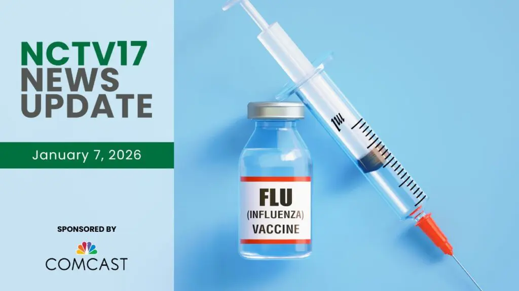 Flu vaccine bottle and needle