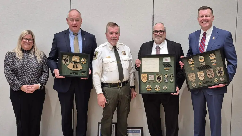 Photo of Naperville Park Board President Leslie Ruffing, Officer Tom Wronski, Park Police Chief Steve Schindlbeck, Officer Jim Goshey, and Lieutenant Scott Wehrli