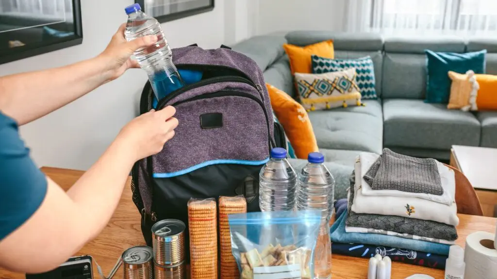packing emergency supplies in backpack