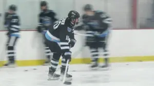 Michael Chenier gets ready to shoot the puck in practice.