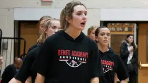 Lucy Tierney warming for Benet girls basketball