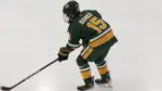 Glenbrook North hockey player warms up