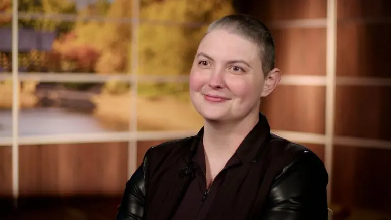 Naperville mom Laura Panozzo, who is battling cancer, smiles during an interview.