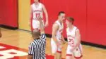 Ty Hughes gets fired up with teammates after layup bucket