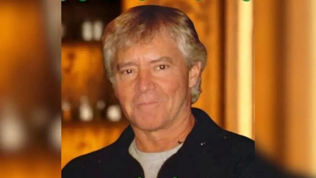 Naperville St. Patrick's Day grand marshal Eddie Curley is seen smiling in a photo.