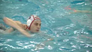 Braden Piwowar goes over the head for incredible shot in victory for Naperville Central over Neuqua Valley.