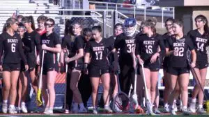 Grace Timmons scores the game winning goal for Benet Academy to open the lacrosse season against Naperville North.