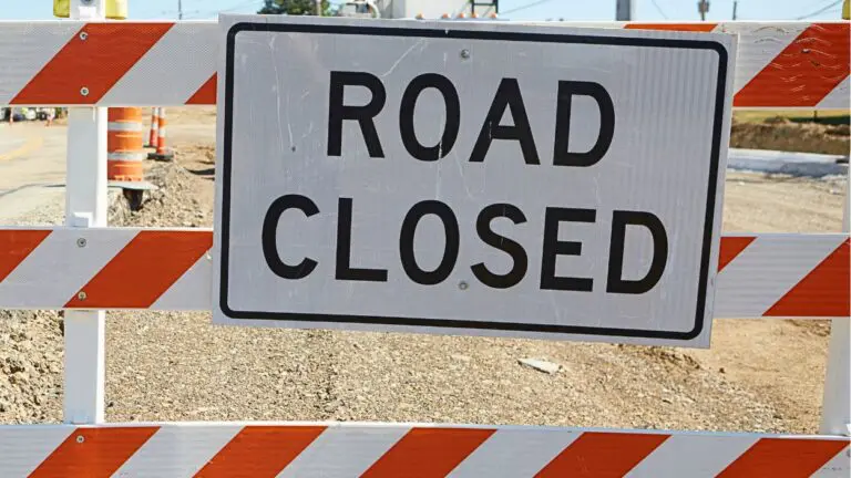 Road closed sign close up