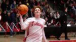 Redwings player looks for layup in warmups before game versus Yorkville
