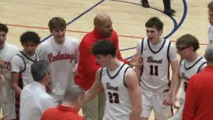 Ed Stasys perfectly times a putback slam to help Benet boys basketball take down West Aurora in the regional championship.