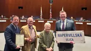 Mayor holds Napervillska sign with Rosemary Macko Wisnosky
