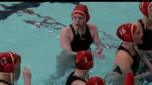 Naperville Central girls water polo in water before match with Neuqua Valley