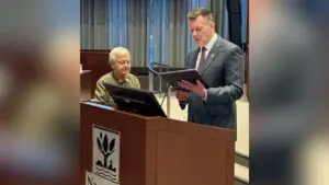Naperville mayor reads proclamation to Rosemary Macko Wisnosky